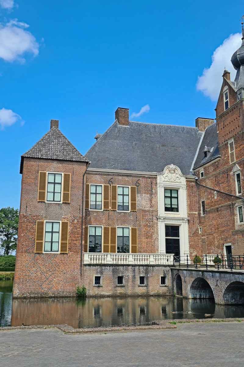 A Dutch castle with a blue sky.
