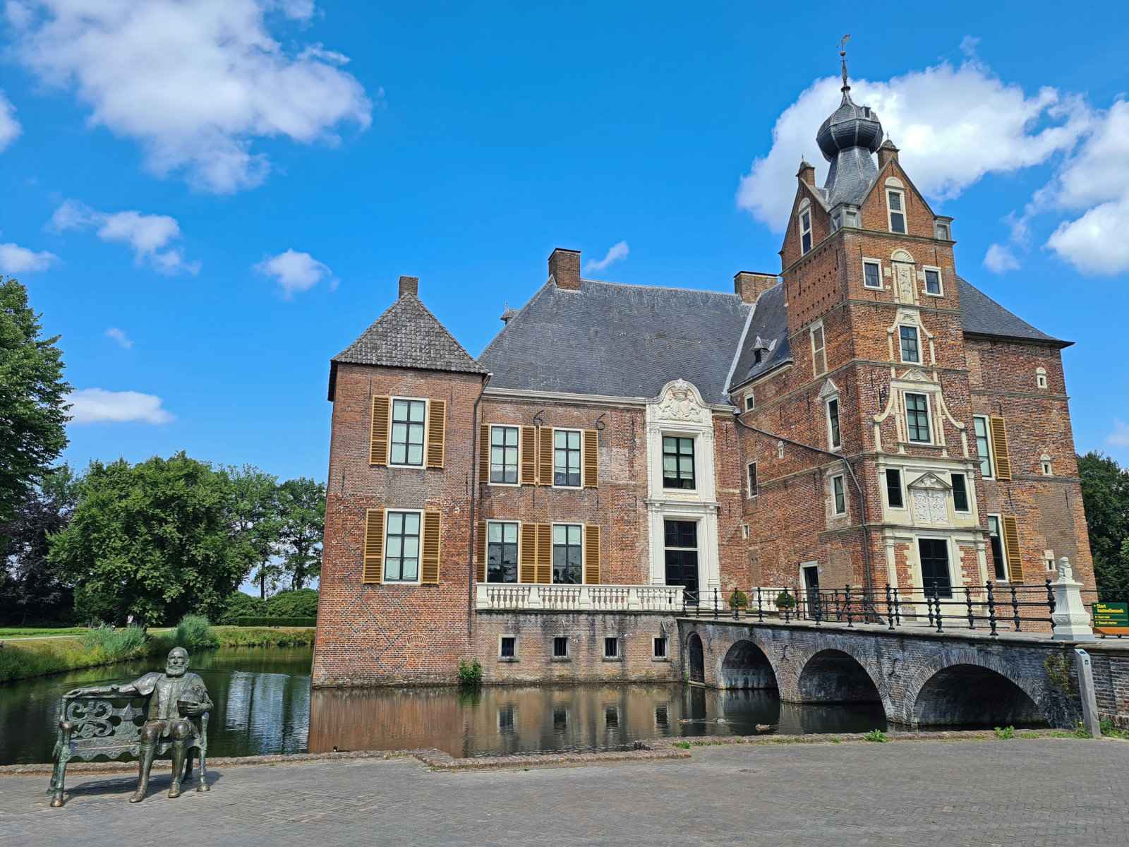 A Dutch castle with a blue sky.